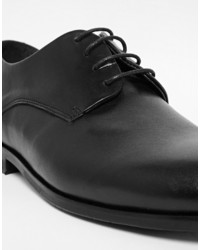 Chaussures derby en cuir noires