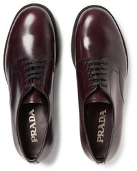 Chaussures derby en cuir noires Prada