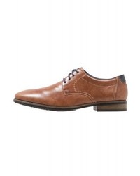 Chaussures derby en cuir tabac Rieker