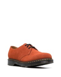 Chaussures derby en daim orange Dr. Martens