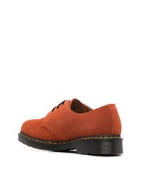 Chaussures derby en daim orange Dr. Martens