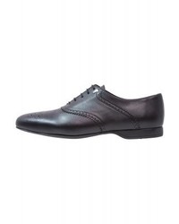 Chaussures derby noires Versace