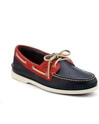 Chaussures en cuir blanc et rouge et bleu marine