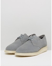 Chaussures en daim grises Dr. Martens