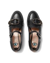 Chaussures plates en cuir à clous noires Gucci