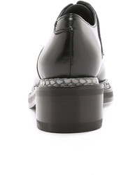 Chaussures richelieu en cuir épaisses noires Acne Studios