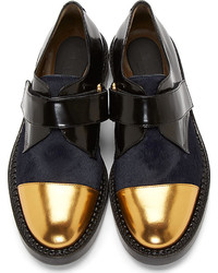 Chaussures richelieu en cuir noir et doré Marni