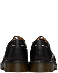 Chaussures richelieu en cuir noires et blanches Dr. Martens