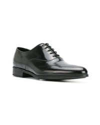 Chaussures richelieu en cuir noires Prada