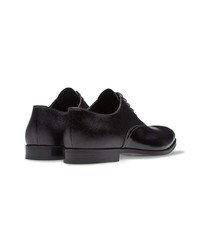 Chaussures richelieu en cuir noires Prada