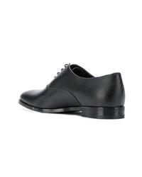 Chaussures richelieu en cuir noires Prada