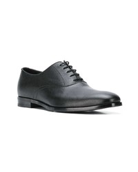 Chaussures richelieu en cuir noires Prada