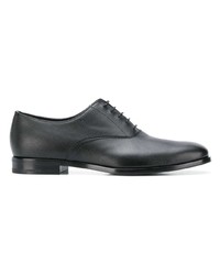 Chaussures richelieu en cuir noires Prada