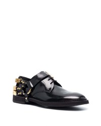 Chaussures richelieu en cuir noires Moschino