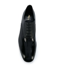 Chaussures richelieu en cuir noires Prada