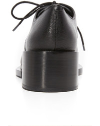Chaussures richelieu en cuir noires DKNY