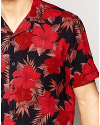 Chemise à manches courtes à fleurs bleu marine Asos