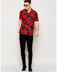 Chemise à manches courtes à fleurs bleu marine Asos