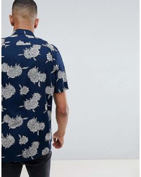 Chemise à manches courtes à fleurs bleu marine Asos