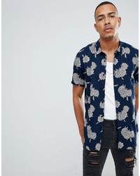 Chemise à manches courtes à fleurs bleu marine Asos