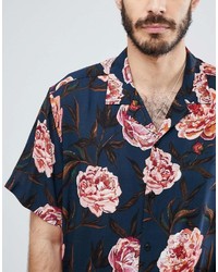 Chemise à manches courtes à fleurs bleu marine Asos