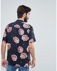 Chemise à manches courtes à fleurs bleu marine Asos