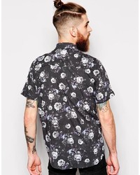 Chemise à manches courtes à fleurs noire