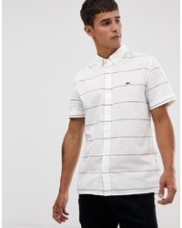 Chemise à manches courtes à rayures horizontales blanche Lacoste