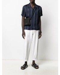 Chemise à manches courtes à rayures verticales bleu marine et blanc Sandro Paris
