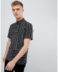 Chemise à manches courtes à rayures verticales noire et blanche Bershka