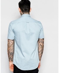 Chemise à manches courtes en denim bleu clair