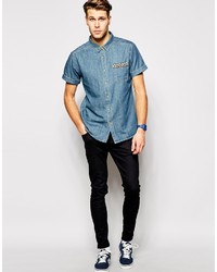 Chemise à manches courtes en denim bleue