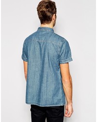 Chemise à manches courtes en denim bleue