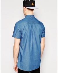 Chemise à manches courtes en denim bleue