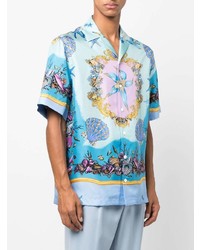 Chemise à manches courtes en soie imprimée bleu clair Versace