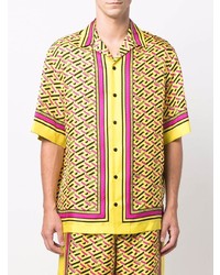 Chemise à manches courtes en soie imprimée jaune Versace