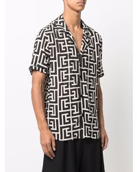 Chemise à manches courtes en soie imprimée noire et blanche Balmain