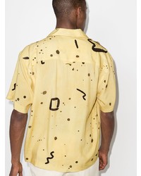 Chemise à manches courtes imprimée jaune Jacquemus