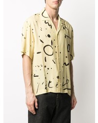 Chemise à manches courtes imprimée jaune Jacquemus