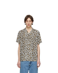 Chemise à manches courtes imprimée léopard blanche