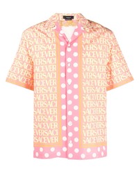 Chemise à manches courtes imprimée rose Versace