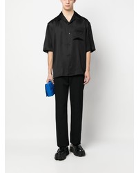 Chemise à manches longues en soie noire Moschino