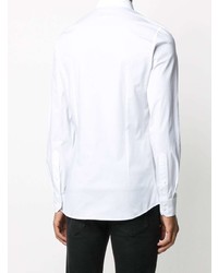 Chemise à manches longues imprimée blanche et noire Moschino