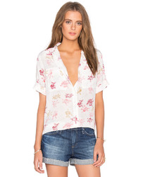 Chemise boutonnée à manches courtes à fleurs blanche