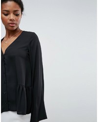 Chemisier à volants noir Asos