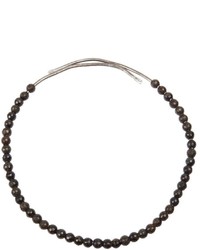 Collier orné de perles olive