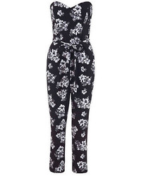 Combinaison pantalon à fleurs noire et blanche