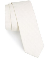 Cravate à carreaux blanche