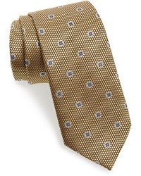 Cravate à fleurs dorée