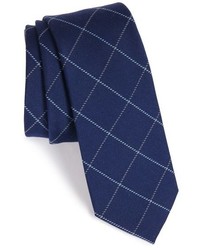 Cravate en soie à carreaux bleu marine